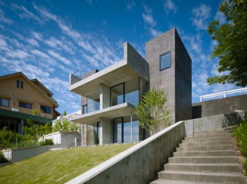model rumah minimalis modern 2 lantai di lahan miring